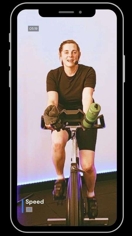 indoor cycling workout on stationary bike high intensity fitness class